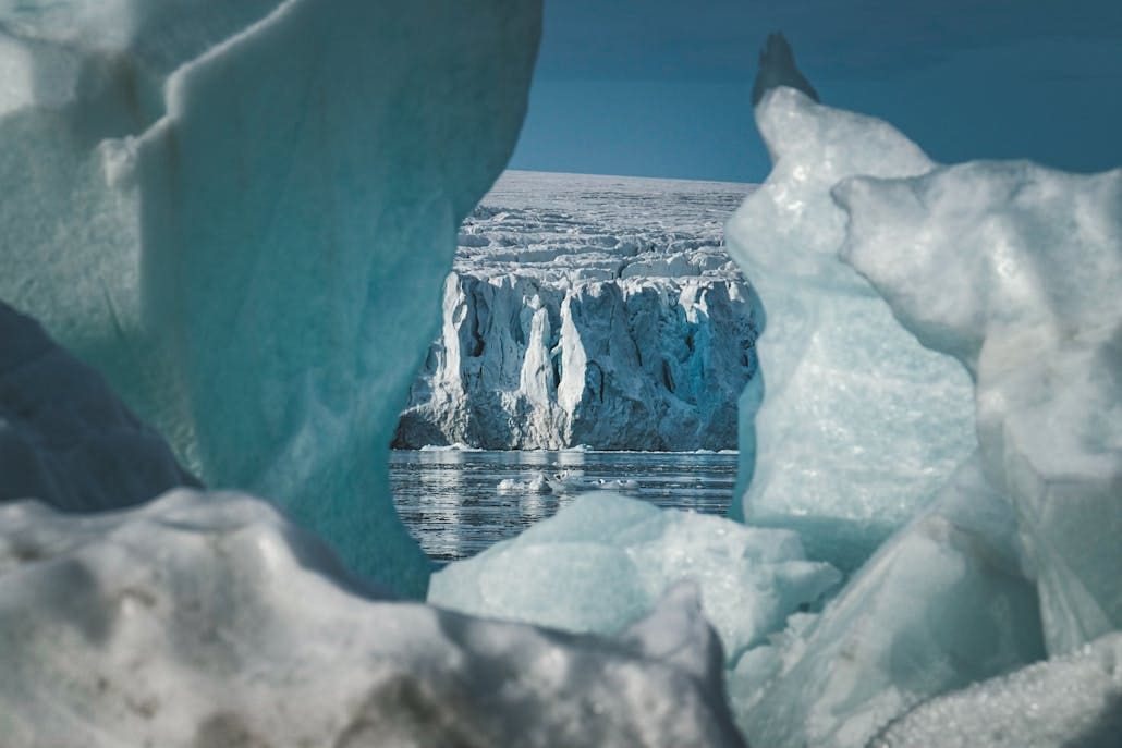 Stunning view of towering icebergs and glacial formations in the Arctic region.